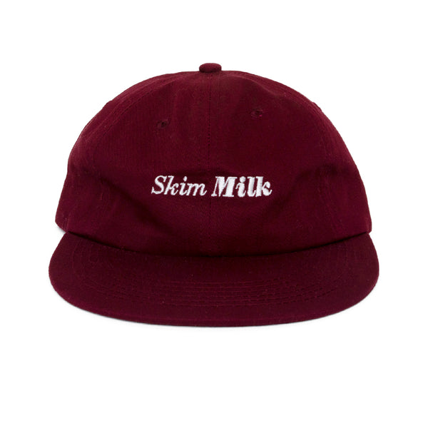 skim milk logo (maroon)